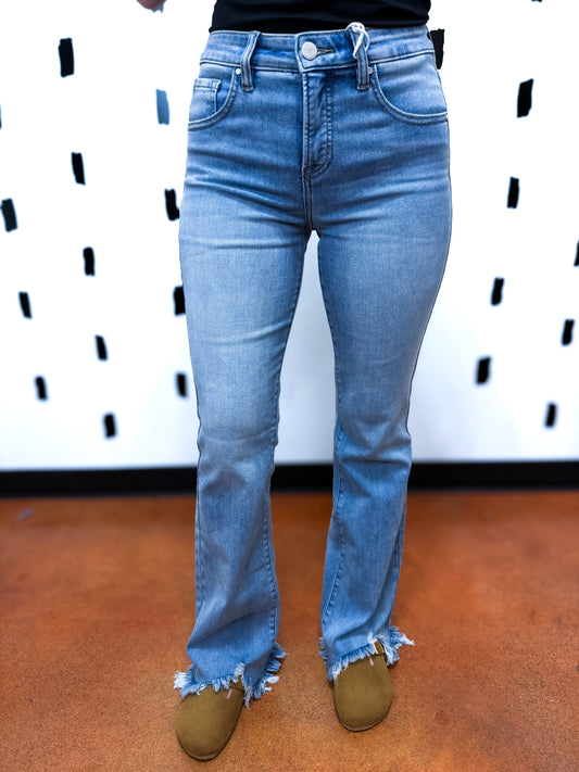 Med Wash Mid Rise Flare Fray Hem Jeans